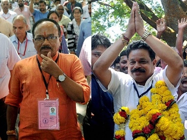 Congress candidate Dayanand Raghunath Sopte (right) celebrates after defeating BJP leader and Goa chief minister Laxmikant Parsekar (left) in the Assembly elections in Panaji on Saturday. PTI