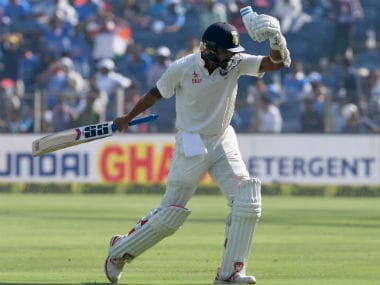 Murali Vijay reacts after his dismissal on Day 2 of the first Test between India and Australia in Pune. AFP
