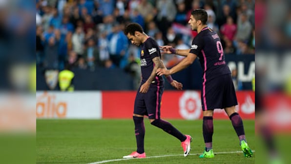 La Liga: 10-man Barcelona fall to defeat at Malaga, fail to close the gap on Real Madrid