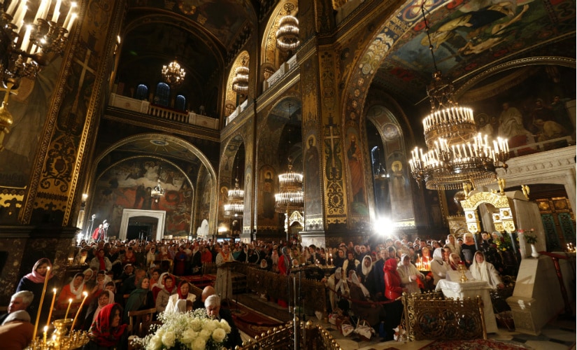 Ukrainian Orthodox believers attend the Orthodox Easter service in St. Volodymyr Cathedral in Kiev, Ukraine, Saturday, April 15, 2017. (