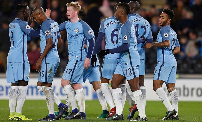 Britain Soccer Football - Hull City v Manchester City - Premier League - The Kingston Communications Stadium - 26/12/16 Manchester City's Raheem Sterling celebrate with team mates after Hull City's Curtis Davies scored an own goal and their third goal Action Images via Reuters / Ed Sykes Livepic EDITORIAL USE ONLY. No use with unauthorized audio, video, data, fixture lists, club/league logos or "live" services. Online in-match use limited to 45 images, no video emulation. No use in betting, games or single club/league/player publications. Please contact your account representative for further details. - RTX2WJXP