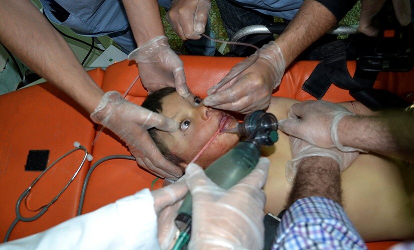 A boy affected by what activists say was a gas attack on the town of Telminnes in Syria. Reuters