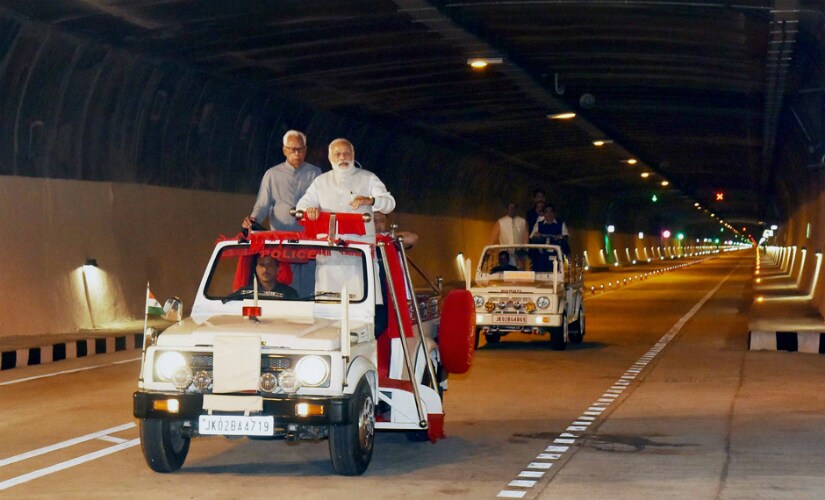 Prime Minister Narendra Modi on Sunday inaugurated the country's longest road tunnel that links Kashmir Valley with Jammu by an all-weather route and reduces the distance by 31 kms. After the inauguration, Modi, along with Vohra and Mehbooba, travelled in an open jeep through the tunnel for some distance. PTI