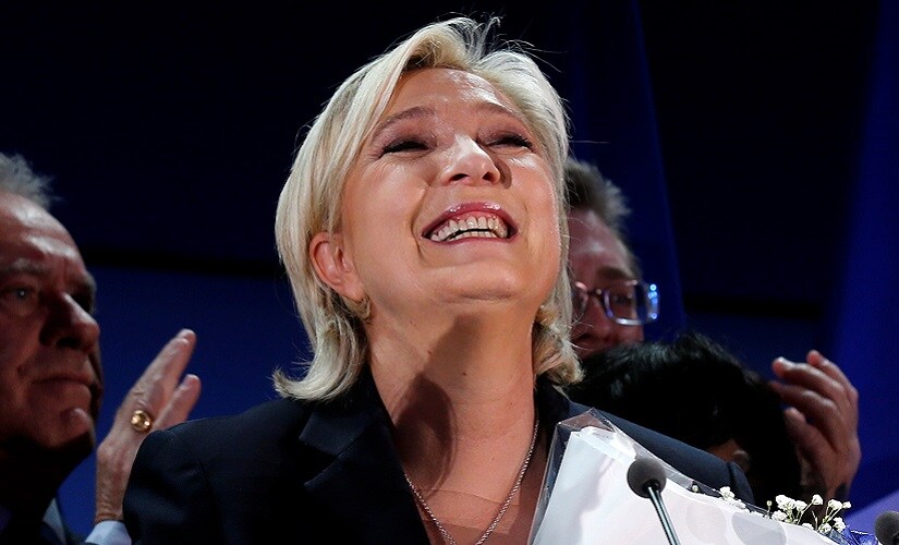 Marine Le Pen, French National Front (FN) political party leader and candidate for French 2017 presidential election, celebrates after early results in the first round of 2017 French presidential election, in Henin-Beaumont, France, April 23, 2017. REUTERS/Pascal Rossignol - RTS13KZW