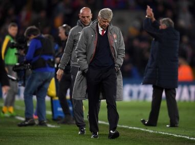 Arsene Wenger, manager of Arsenal looks dejected after the defeat to Crystal Palace. Getty