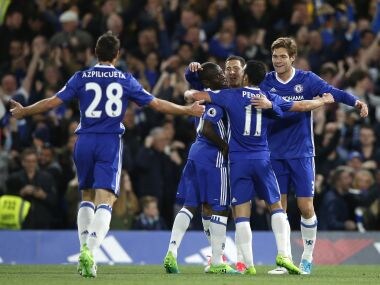 Chelsea players celebrate after Eden Hazard scored the opening goal against Manchester City. AP