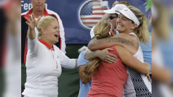 Fed Cup: United States set up final against Belarus; Ilie Nastase suspended by ITF for abusive behaviour