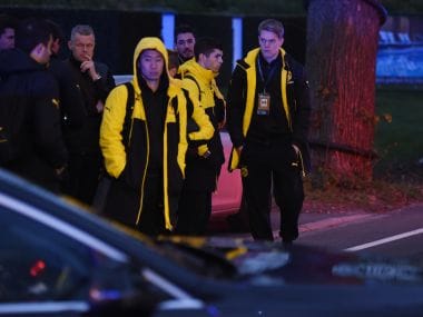 Police escort Dortmund's players after the team bus was hit with three blasts. AFP