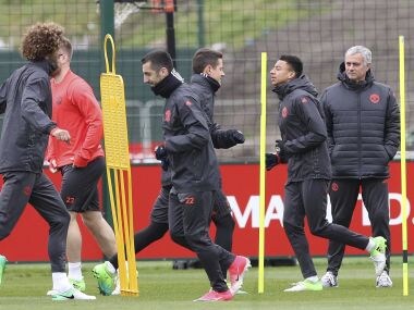 Manchester United manager Jose Mourinho, right, during training ahead of their Europa League tie. AP