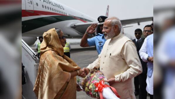 LIVE: Modi takes veiled dig at Pakistan as he and Hasina honour kin of Indian soldiers killed in 1971 war