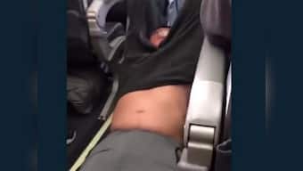 US: United Airlines apologises after Asian doctor dragged off flight