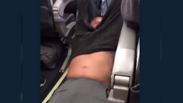 US: United Airlines apologises after Asian doctor dragged off flight