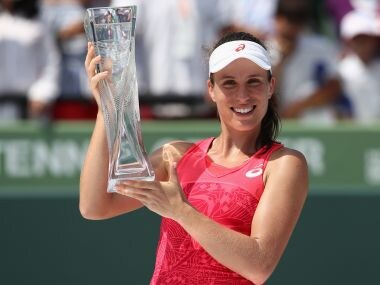 Johanna Konta celebrates with the trophy after defeating Caroline Wozniacki. Getty