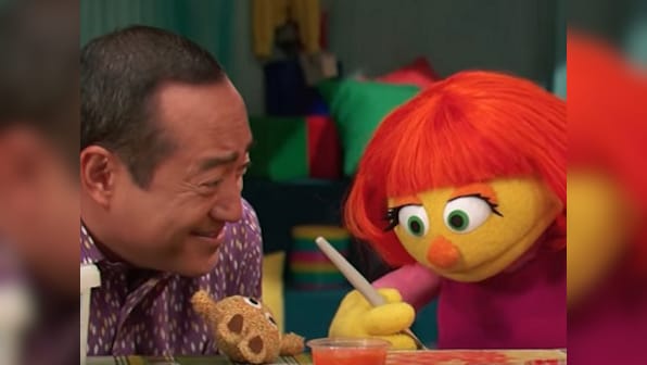 Sesame Street introduces new Muppet Julia: A shy red head who has autism, loves to draw