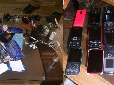 Jammu and Kashmir bypolls: Police recover cellphones from Baramulla district jail, suspect inmates' role in unrest Jammu and Kashmir bypolls: Police recover cellphones from Baramulla district jail, suspect inmates' role in unrest