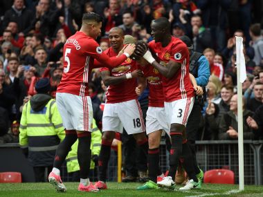 Manchester United's Ander Herrera (C) celebrates scoring with teammates. AFP