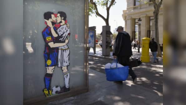 La Liga: Lionel Messi-Cristiano Ronaldo kiss graffiti causes stir in Barcelona ahead of El Clasico