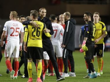 Thomas Tuchel hugs Dortmund's Lukasz Piszczek after the Champions League match. AP