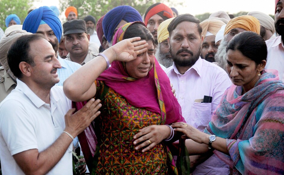 Wife of CRPF personnel Inspector Raghbir Singh salutes her husband's body during his funeral in Sathiala, some 50 km from Amritsar on Tuesday. 25 CRPF personnel were killed on Monday in Chhattisgarh's Sukma district. PTI Wife of CRPF personnel Inspector Raghbir Singh salutes her husband's body during his funeral in Sathiala, some 50 km from Amritsar on Tuesday. 25 CRPF personnel were killed on Monday in Chhattisgarh's Sukma district. PTI