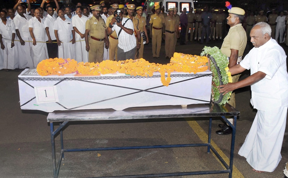 Union Minister Radhakrishnan pays respect to the body of CRPF personnel Alagupandi, at Madurai Airport on Tuesday. PTI Union Minister Radhakrishnan pays respect to the body of CRPF personnel Alagupandi, at Madurai Airport on Tuesday. PTI