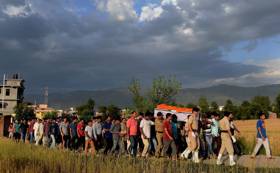 Relatives and family members carry the body of Surender Thakur for cremation at his native place, Ner Chowk Mandi on Tuesday. PTI Relatives and family members carry the body of Surender Thakur for cremation at his native place, Ner Chowk Mandi on Tuesday. PTI