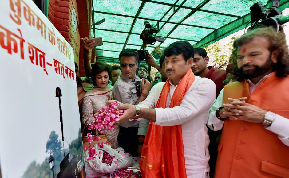 Delhi BJP President and MP, Manoj Tiwari, Hans Raj Hans and others paying homage to CRPF martyers as party dedicated its landslide win in the MCD elections to the CRPF personnel killed in the recent Sukma attack, in New Delhi on Wednesday. PTI Delhi BJP President and MP, Manoj Tiwari, Hans Raj Hans and others paying homage to CRPF martyers as party dedicated its landslide win in the MCD elections to the CRPF personnel killed in the recent Sukma attack, in New Delhi on Wednesday. PTI