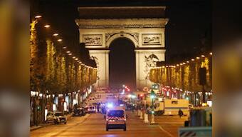 Car ploughs into police van in Paris Champs-Elysees 'attack'