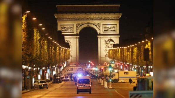 Car ploughs into police van in Paris Champs-Elysees 'attack'