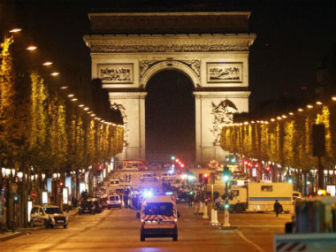Car ploughs into police van in Paris Champs-Elysees 'attack' Car ploughs into police van in Paris Champs-Elysees 'attack'