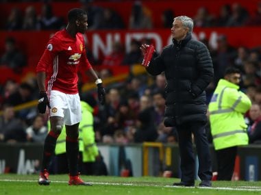 Jose Mourinho, manager of Manchester United gives instruction to Paul Pogba. Getty
