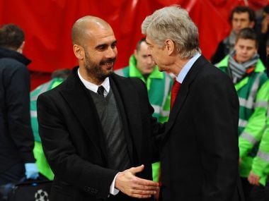 Manchester City manager Pep Guardiola (L) and Arsenal manager Arsene Wenger. AFP