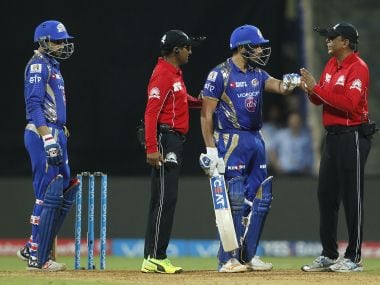 Mumbai Indians captain Rohit Sharma talks with the umpires. Sportzpics/IPL