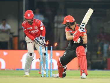 Royal Challengers Bangalore's Shane Watson is bowled duing the match against Kings XI Punjab. AFP