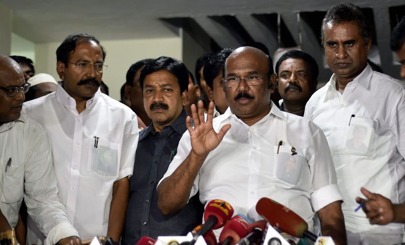 Tamil Nadu ministers addressed media after a sudden meeting to retrieve two leaves symbol in Chennai on Monday. PTI