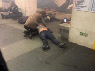 Blast victims lie near a subway train hit by a explosion at the Tekhnologichesky Institut subway station in St Petersburg in Russia on Monday. AP