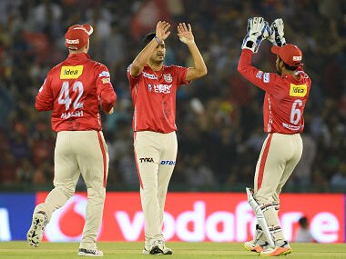Kings Xi Punjab bowler Mohit Sharma celebrates with his teammates after he dismissed Kolkata Knight Riders batsman Sunil Narine. AFP