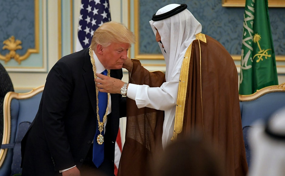 The US president was given a warm welcome in the oil-rich kingdom — a mood in sharp contrast to Washington where pressure is building after fresh claims over his team's alleged links to Moscow. Trump received the Order of Abdulaziz al-Saud medal from Saudi Arabia's King Salman bin Abdulaziz al-Saud (R) at the Saudi Royal Court in Riyadh on 20 May, 2017. AFP The US president was given a warm welcome in the oil-rich kingdom — a mood in sharp contrast to Washington where pressure is building after fresh claims over his team's alleged links to Moscow. Trump received the Order of Abdulaziz al-Saud medal from Saudi Arabia's King Salman bin Abdulaziz al-Saud (R) at the Saudi Royal Court in Riyadh on 20 May, 2017. AFP