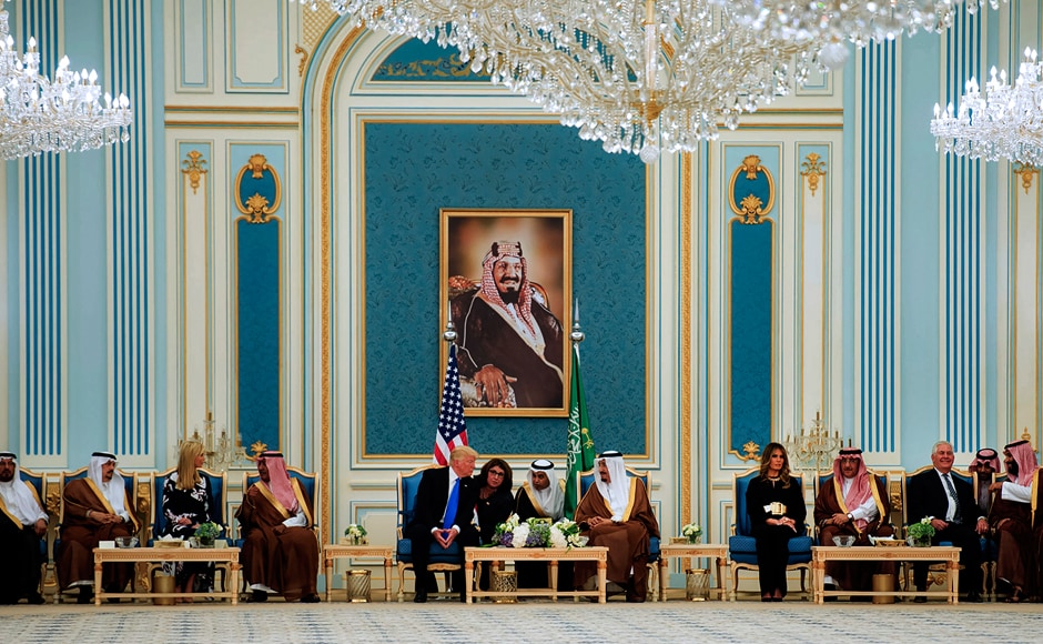 Trump and his wife, who dressed conservatively in black but did not cover her hair as Saudi women are required to do, walked side-by-side to the tarmac where they both shook hands with the 81-year-old king. AFP Trump and his wife, who dressed conservatively in black but did not cover her hair as Saudi women are required to do, walked side-by-side to the tarmac where they both shook hands with the 81-year-old king. AFP
