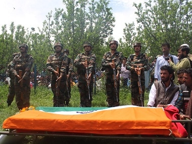 Soldiers pay respect to Lieutenant Ummer Fayaz at his funeral on Wednesday. Firstpost/Sameer Yasir
