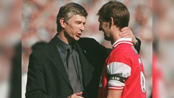 Premier League: Arsenal boss Arsene Wenger feels sad over Tony Adams' 'paper bag' comment