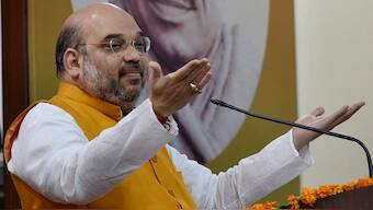 Amit Shah listens to Narendra Modi's Mann ki Baat with Delhi slum-dwellers