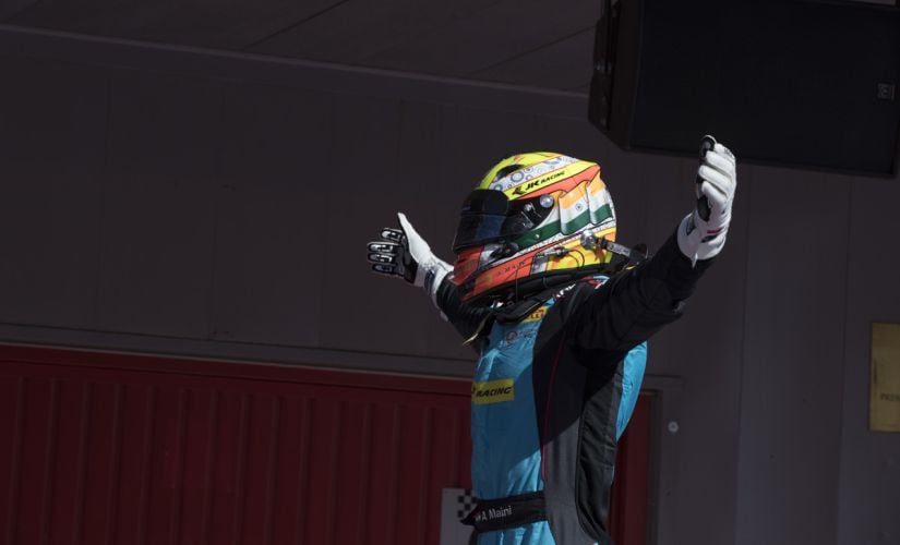 Arjun Maini celebrates his win after the race.