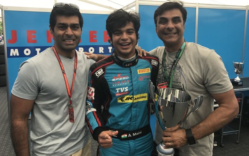 Arjun Maini with his father and Karan after the GP3 race victory.