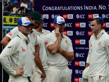 Australia's captain Steve Smith (L) waits with teammates during the award ceremony on the fourth day of the fourth and final cricket Test match between India and Australia at The Himachal Pradesh Cricket Association Stadium in Dharamsala on March 28, 2017. ----IMAGE RESTRICTED TO EDITORIAL USE - STRICTLY NO COMMERCIAL USE----- / GETTYOUT---- / AFP PHOTO / PRAKASH SINGH / ----IMAGE RESTRICTED TO EDITORIAL USE - STRICTLY NO COMMERCIAL USE----- / GETTYOUT