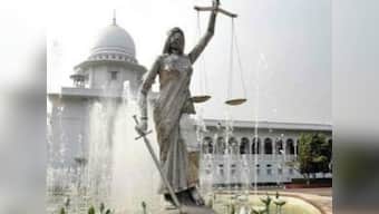 Bangladesh reinstalls 'controversial' statue of blind-folded, sari-clad woman deemed unsuitable by hardliners