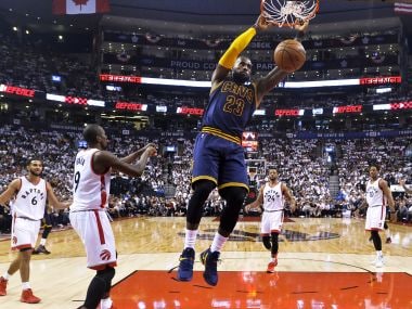 Cleveland Cavaliers forward LeBron James (23) slam dunks the ball against Toronto Raptors. AP