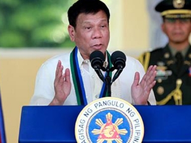 Philippines president Rodrigo Duterte says martial law could last a year Philippines president Rodrigo Duterte says martial law could last a year