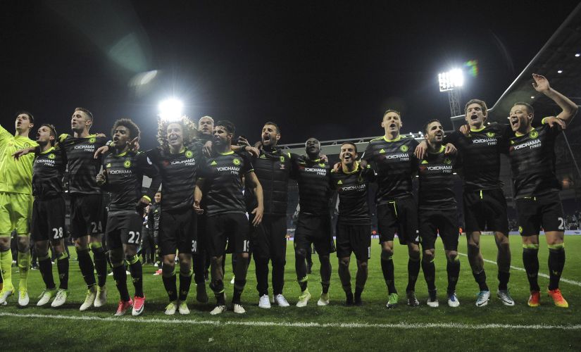 Chelsea's players celebrate after wrapping up the English Premier League title. AP