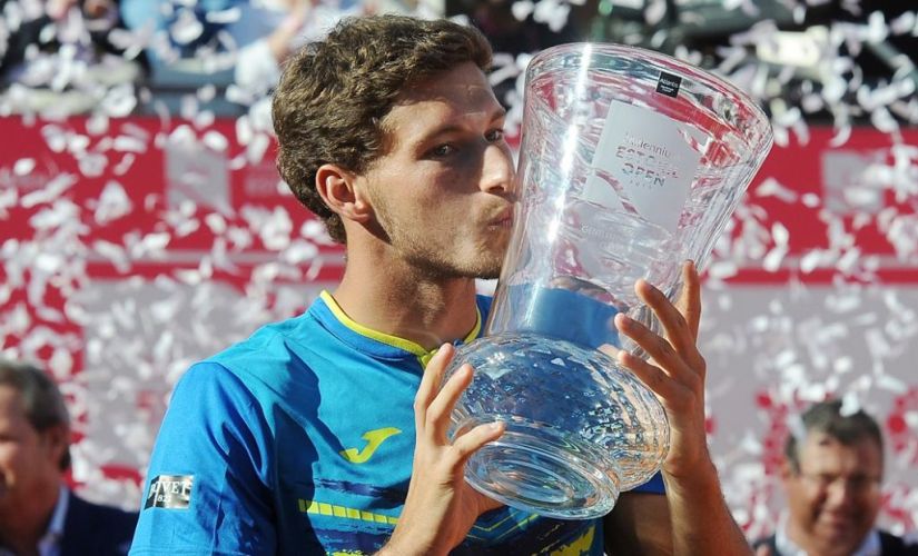 Pablo Carreno, the top seed, claimed his third ATP title by defeating Gilles Muller in the final of the Estoril Open. Image courtesy: Twitter/@EstorilOpen