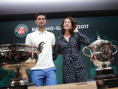 Defending champions Novak Djokovic and Garbine Muguruza at the French Open draw. AP